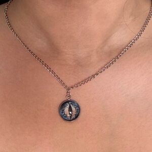 Earthy Mythical Creature Cat Eye Silver Necklace